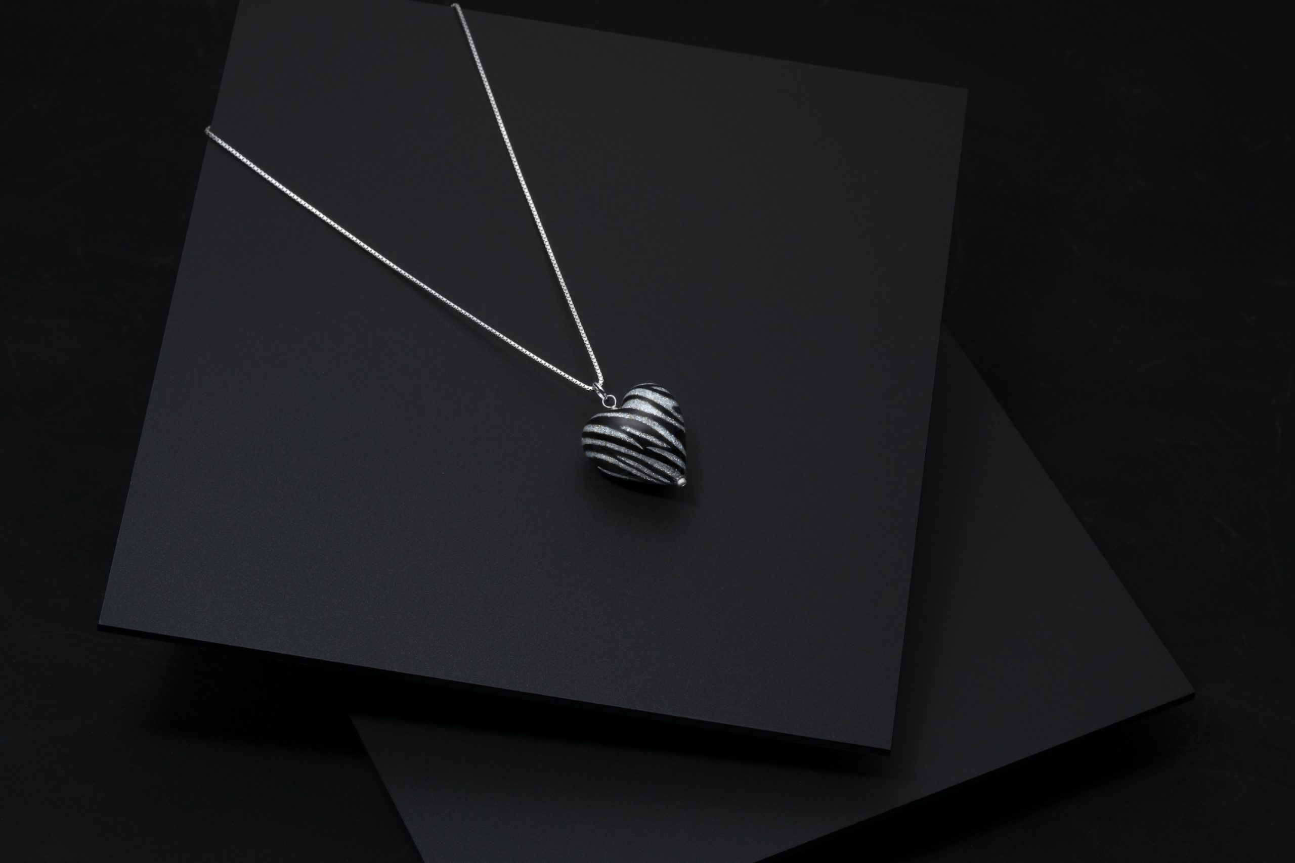 murano glass heart zebra necklace